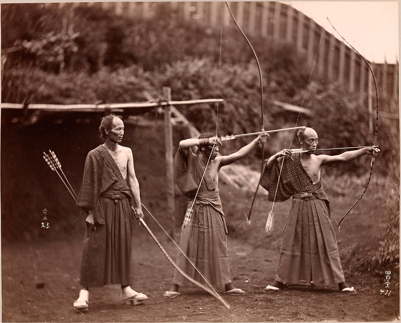 Japanese archers practicing Kyudo and the art of zanshin. 